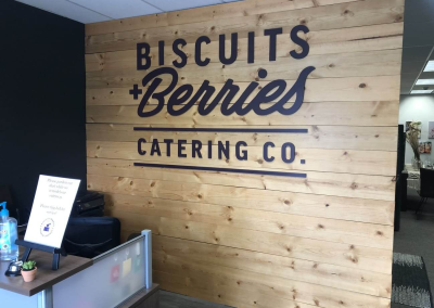 Biscuits and Berries brand decor acrylic lobby sign Golden Co