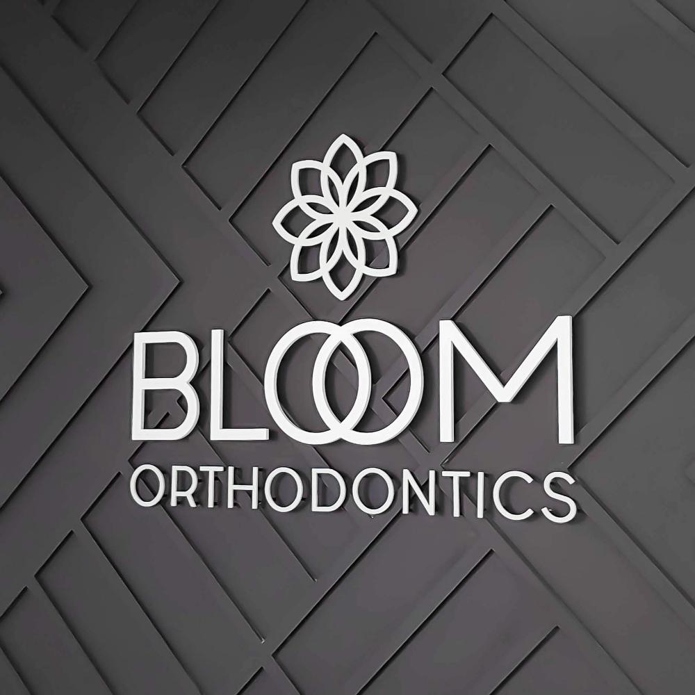Bloom Orthodontics dimensional acrylic brand decor sign Centennial CO