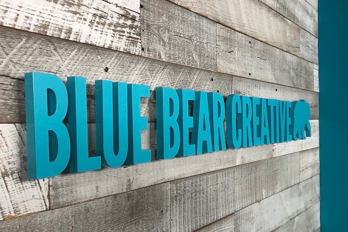 Blue Bear Creative Indoor SIgnage Vision Visual Design and fabrication Denver CO