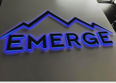 Emerge exterior sign RGB LED push through acrylic brand logo blue color Denver CO
