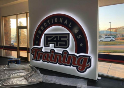F45 Training interior halo illuminated brand logo Colorado Springs CO