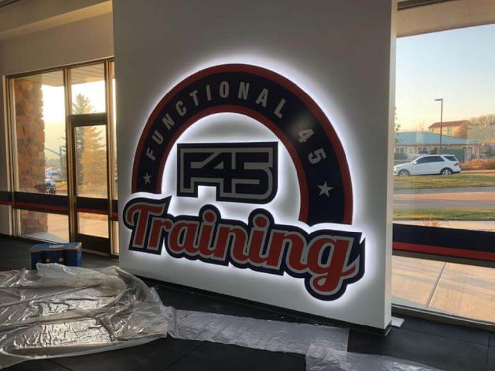 F45 Training interior halo illuminated brand logo Colorado Springs CO