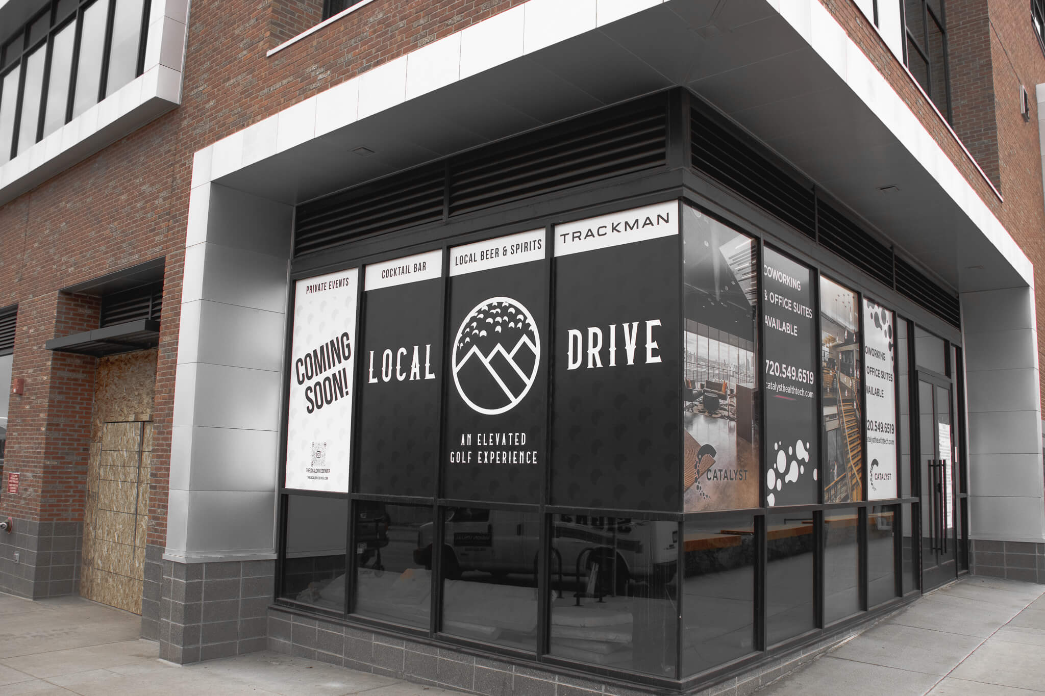 Outdoor window graphics on The Local Drive storefront, Denver CO