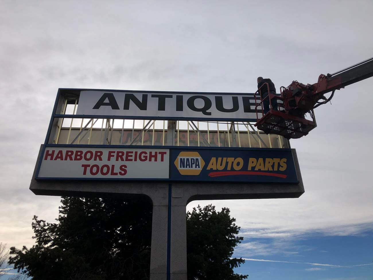 Hot Shot exterior illuminated projecting blade sign cabinet Cheyenne WY