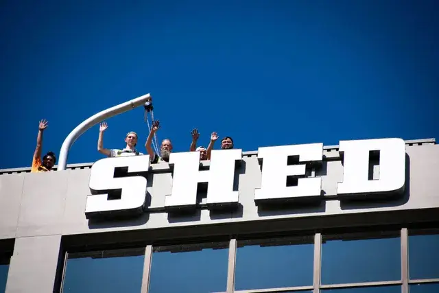 TUFF SHED high rise mid-rise install process Vision Visual Custom Sign Company Team