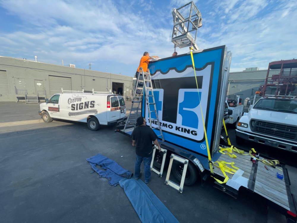 thermo king illumintad flex face — wall cabinet sign loaded for transport at Vision Visual Golden, CO