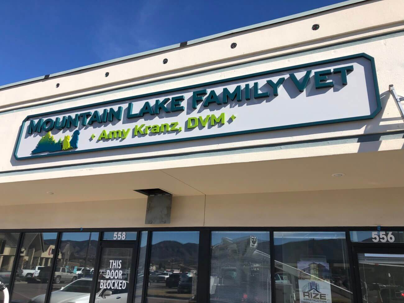 Vision Visual crane and bucket truck LED retrofit service John Deere pole sign Greeley CO