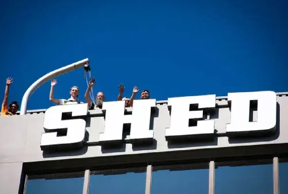 TUFF SHED high rise mid-rise install process Vision Visual Custom Sign Company Team