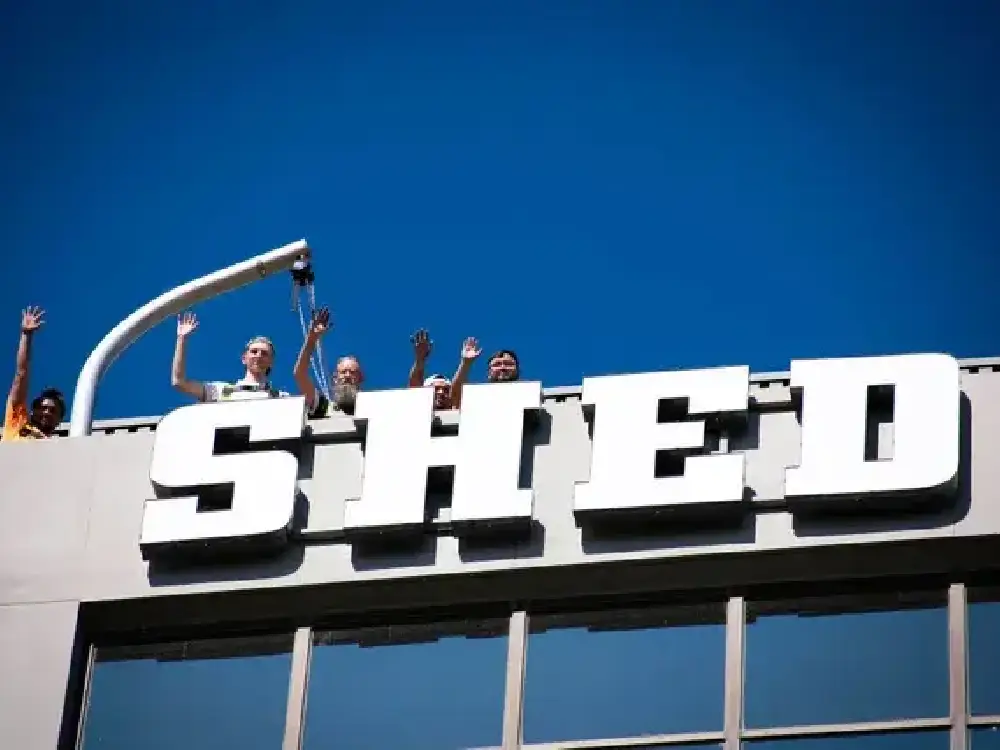 TUFF SHED high rise mid-rise install process Vision Visual Custom Sign Company Team