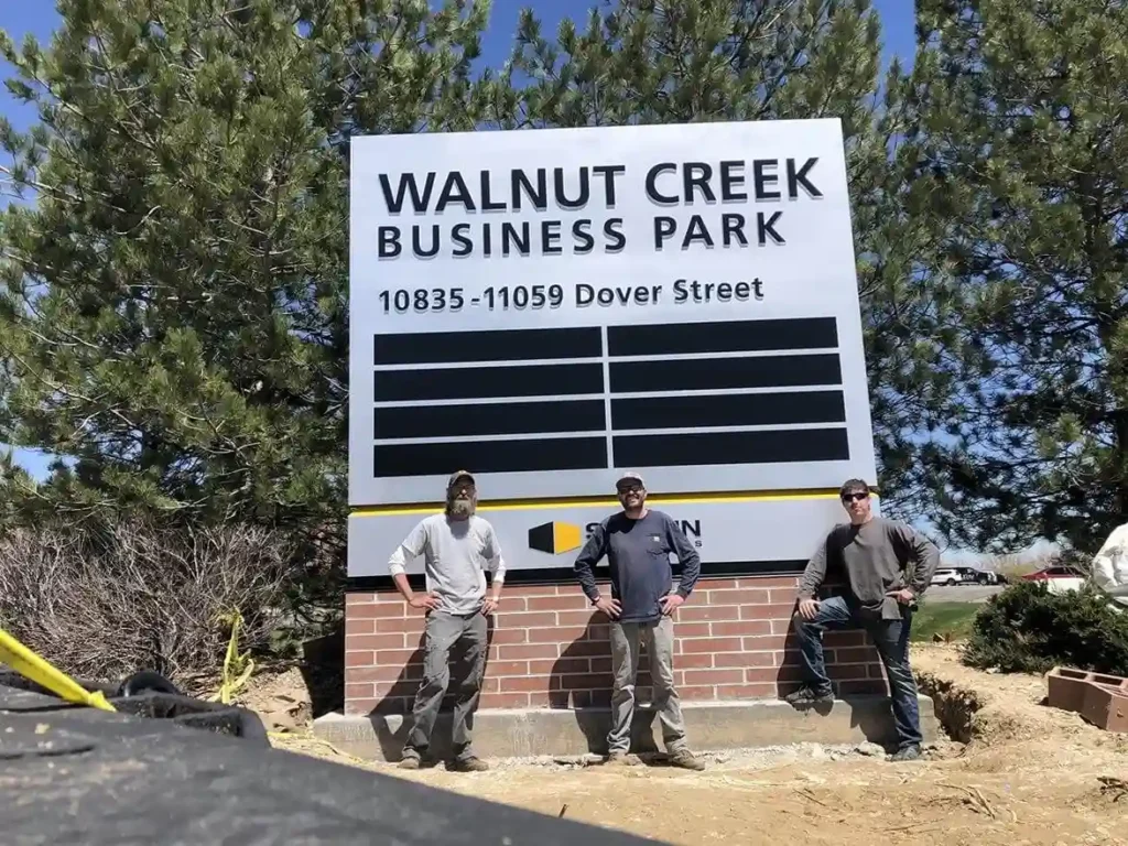 Monument sign installed at commercial property entrance in Denver CO