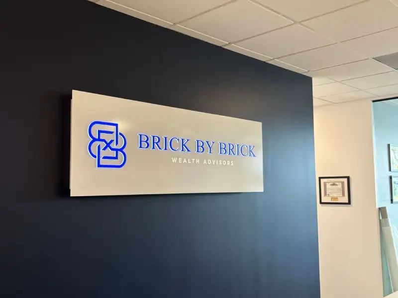 Custom illuminated indoor office sign installed by Vision Visual Signs in Denver CO
